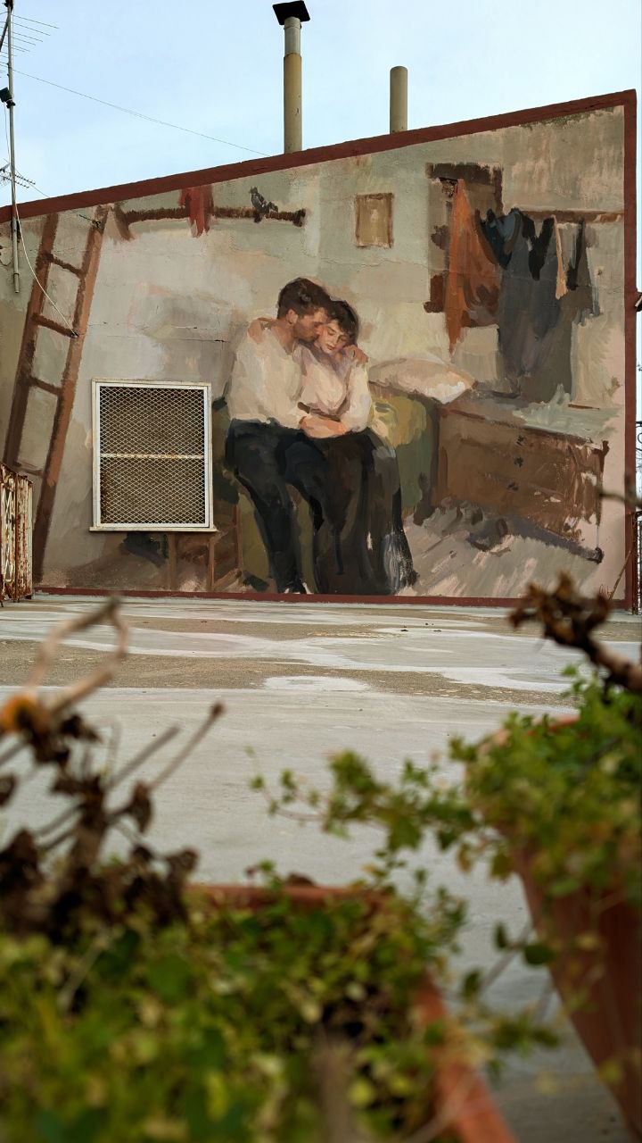 Dipinto di persone abbracciate